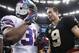 Former Buffalo Bills safety Jairus Byrd (left) and New Orleans Saints quarterback Drew Brees.