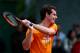 PARIS, FRANCE - MAY 24: Andy Murray of Great Britain plays a shot during a practice session ahead of the French Open at Roland Garros on May 24, 2014 in Paris, France. (Photo by Dan Istitene/Getty Images)