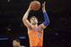 Dec 8, 2013; New York, NY, USA; New York Knicks power forward Andrea Bargnani (77) pulls down a rebound against the Boston Celtics during the first half at Madison Square Garden. Mandatory Credit: Joe Camporeale-USA TODAY Sports