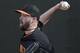 San Francisco Giants pitcher Heath Hembree throws during spring training baseball practice Sunday, Feb. 16, 2014, in Scottsdale, Ariz. (AP Photo/Gregory Bull)