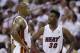 Miami Heat guard Norris Cole (30) talks to Ray Allen during the first half of Game 3 in the NBA basketball Eastern Conference finals playoff series against the Indiana Pacers, Saturday, May 24, 2014, in Miami. (AP Photo/Lynne Sladky)