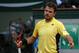 Switzerland's Stanislas Wawrinka reacts as he plays Spain's Guillermo Garcia-Lopez during their first round match of the French Open tennis tournament at the Roland Garros stadium, in Paris, France, Monday, May 26, 2014. (AP Photo/Michel Euler)