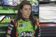Danica Patrick watches as crew members work on her car before practice for Sunday's NASCAR Sprint Cup series Coca-Cola 600 auto race at Charlotte Motor Speedway in Concord, N.C., Thursday, May 22, 2014. (AP Photo/Mike McCarn)