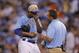 Kansas City Royals starting pitcher Yordano Ventura (30) is checked out by a team trainer before being relieved in the third inning of a baseball game against the Houston Astros at Kauffman Stadium in Kansas City, Mo., Monday, May 26, 2014. Ventura gave up five runs in the first two innings. (AP Photo/Orlin Wagner)