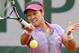 Chinas Li Na returns the ball to France's Kristina Mladenovic during their first round match of the French Open tennis tournament at the Roland Garros stadium, in Paris, France, Tuesday, May 27, 2014. (AP Photo/David Vincent)
