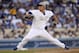 Los Angeles Dodgers starting pitcher Hyun-Jin Ryu throws in the fourth inning of a baseball game against the Cincinnati Reds, Monday, May 26, 2014, in Los Angeles. (AP Photo/Gus Ruelas)