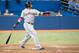 May 13, 2014; Toronto, Ontario, CAN; Cleveland Indians third baseman Carlos Santana (41) reacts to hitting a ball in a game against the Toronto Blue Jays at Rogers Centre. Toronto Blue Jays won 5-4. Mandatory Credit: Nick Turchiaro-USA TODAY Sports