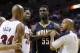 Official Marc Davis (8) and Miami Heat forward Udonis Haslem (40), separate, Indiana Pacers center Roy Hibbert (55) and Miami Heat guard Ray Allen (34), during the second half of Game 4 in the NBA basketball Eastern Conference finals playoff series, Monday, May 26, 2014, in Miami. (AP Photo/Wilfredo Lee)