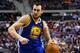 Feb 24, 2014; Auburn Hills, MI, USA; Golden State Warriors center Andrew Bogut (12) moves the ball against the Detroit Pistons at The Palace of Auburn Hills. Mandatory Credit: Rick Osentoski-USA TODAY Sports
