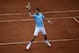 Serbia's Novak Djokovic returns the ball to Portugal's Joao Sousa during the first round match of the French Open tennis tournament at the Roland Garros stadium, in Paris, France, Monday, May 26, 2014. Djokovic won 6-1, 6-2, 6-4. (AP Photo/Michel Euler)