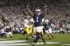 STATE COLLEGE, PA - OCTOBER 12: Bill Belton #1 of the Penn State Nittany Lions celebrates after rushing for the game winning touchdown against the Michigan Wolverines during the game on October 12, 2013 at Beaver Stadium in State College, Pennsylvania. The Nittany Lions defeated the Wolverines 43-40 in four overtimes. (Photo by Justin K. Aller/Getty Images)