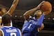 Kentucky's James Young (1) shoots during the first half of an NCAA college basketball game against Auburn, Wednesday, Feb. 12, 2014, in Auburn, Ala. (AP Photo/Butch Dill)