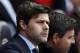 FILE - In this Sunday, May 11, 2014, file photo, Southampton's manager Mauricio Pochettino looks on from the dugout before the start of their English Premier League soccer match against Manchester United at St Mary's stadium, Southampton, England. Tottenham has hired Mauricio Pochettino as the club's new manager on a five-year contract, with the former Argentina defender making the move from fellow Premier League side Southampton. (AP Photo/Sang Tan, File)