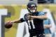 ADVANCE FOR USE WEEKEND, MAY 3-4 - FILE - In this Nov. 17, 2013, file photo, Jacksonville Jaguars quarterback Blaine Gabbert warms up prior to the first half of an NFL football game against the Arizona Cardinals in Jacksonville, Fla. Jacksonville Jaguars took Gabbert out of Missouri. The Jaguars didn’t have much support for him at other positions, but he struggled to keep up with the pro-style offense and went 5-22 as a starter, with one touchdown against seven interceptions over three starts last season. (AP Photo/John Raoux, File)