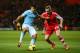 SOUTHAMPTON, ENGLAND - DECEMBER 07: Luke Shaw of Southampton and Sergio Aguero of Manchester City in action during the Barclays Premier League match between Southampton and Manchester City at St Mary's Stadium on December 7, 2013 in Southampton, England. (Photo by Bryn Lennon/Getty Images)