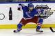 New York Rangers' Martin St. Louis celebrates his game-winning goal during overtime in Game 4 of the NHL hockey Stanley Cup playoffs Eastern Conference finals against the Montreal Canadiens, Sunday, May 25, 2014, in New York. The Rangers defeated the Canadiens in overtime 3-2. (AP Photo/Seth Wenig)