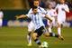 ST. LOUIS, MO - NOVEMBER 18: Sergio Aguero #10 of Argentina passes the ball against Bosnia-Herzegovina during the international friendly match between Bosnia-Herzegovina and Argentina at Busch Stadium on November 18, 2013 in St. Louis, Missouri. (Photo by Dilip Vishwanat/Getty Images)