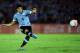 MONTEVIDEO, URUGUAY - NOVEMBER 20: Luis Suarez of Uruguay runs with the ball during leg 2 of the FIFA World Cup Qualifier match between Uruguay and Jordan at Centenario Stadium Stadium on November 20, 2013 in Montevideo, Uruguay. (Photo by Friedemann Vogel/Getty Images)