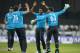 MANCHESTER, ENGLAND - MAY 28: Chris Jordan of England celebrates with England captain Alastair Cook and Jos Buttler after dismissing Nuwan Kulasekara of Sri Lanka during the 3rd Royal London One Day International match between England and Sri Lanka at Old Trafford on May 28, 2014 in Manchester, England. (Photo by Gareth Copley/Getty Images)