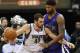 Minnesota Timberwolves' Kevin Love, left, attempts to drive around Sacramento Kings' DeMarcus Cousins in the second half of an NBA basketball game Monday, Jan. 16, 2012, in Minneapolis. The Timberwolves won 99-86 with Love leading the scoring with 33 points and 11 rebounds. (AP Photo/ Jim Mone)