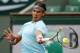 Spain's Rafael Nadal returns the ball to Austria's Dominic Thiem during their second round match of the French Open tennis tournament at the Roland Garros stadium, in Paris, France, Thursday, May 29, 2014. (AP Photo/Darko Vojinovic)