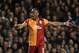 Galatasaray's Didier Drogba reacts to referee Felix Brych showing him a yellow card during the Champions League last 16 second leg soccer match between Chelsea and Galatasaray at Stamford Bridge stadium in London, Tuesday, March 18, 2014. (AP Photo/Matt Dunham)