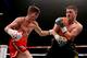 MANCHESTER, ENGLAND - NOVEMBER 23: Luke Campbell (L) in action during his Lightweight bout at Phones4u Arena on November 23, 2013 in Manchester, England. (Photo by Scott Heavey/Getty Images)