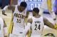 Indiana Pacers' Roy Hibbert and Paul George celebrate after George hit a shot as time expired to end the third quarter of Game 5 of the Eastern Conference finals NBA basketball playoff series against the Miami Heat on Wednesday, May 28, 2014, in Indianapolis. (AP Photo/Darron Cummings)