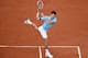 PARIS, FRANCE - MAY 28: Novak Djokovic of Serbia returns a shot during his men's singles match against Jeremy Chardy of France on day four of the French Open at Roland Garros on May 28, 2014 in Paris, France. (Photo by Matthias Hangst/Getty Images)
