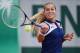 PARIS, FRANCE - MAY 28: Dominika Cibulkova of Slovakia returns a shot during her women's singles match against Tamira Paszek of Austria on day four of the French Open at Roland Garros on May 28, 2014 in Paris, France. (Photo by Matthias Hangst/Getty Images)