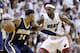 Miami Heat forward LeBron James (6) defends Indiana Pacers forward Paul George (24) during the second half of Game 5 in the NBA basketball playoffs Eastern Conference finals, Thursday, May 30, 2013, in Miami. (AP Photo/Lynne Sladky)