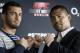 Dutch middleweight fighter Gegard Mousasi, left, and Mark Munoz from the US, right, pose for the photographers prior to a joint press conference in Berlin, Germany, Thursday, April 3, 2014. Munoz and Mousasi will fight during a UFC (Ultimate Fighting Championship) fight night in Berlin on Saturday, May 31, 2014. (AP Photo/Michael Sohn)