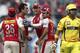 Kings XI Punjab's Azhar Mahmood, second left, Adam Gilchrist, center, and Piyush Chawla, second right, celebrate the dismissal of Chennai Super Kings' Suresh Raina during an Indian Premier League cricket match in Dharmsala, India, Thursday, May 17, 2012. (AP Photo) INDIA OUT