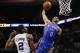 May 29, 2014; San Antonio, TX, USA; Oklahoma City Thunder guard Russell Westbrook (0) dunks over San Antonio Spurs forward Kawhi Leonard (2) during the first half in game five of the Western Conference Finals of the 2014 NBA Playoffs at AT&T Center. Mandatory Credit: Soobum Im-USA TODAY Sports
