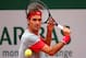 PARIS, FRANCE - MAY 28: Roger Federer of Switzerland returns a shot during his men';s singles match against Diego Sebastian Schwartzman of Argentina on day four of the French Open at Roland Garros on May 28, 2014 in Paris, France. (Photo by Clive Brunskill/Getty Images)