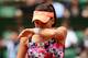 PARIS, FRANCE - MAY 30: Agnieszka Radwanska of Poland reacts during her women's singles match against Ajla Tomljanovic of Croatia on day six of the French Open at Roland Garros on May 30, 2014 in Paris, France. (Photo by Matthew Stockman/Getty Images)