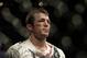 Chael Sonnen stands during a UFC mixed martial arts match against Anderson Silva in Oakland, California, Saturday, August 7, 2010. Silva won by submission in the fifth round to retain the championship. (AP Photo/Jeff Chiu)