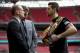 IBF and WBA super-middleweight boxing champion Carl Froch, right, poses for photographers in a head-to-head with his opponent George Groves, left, and British boxing promoter Eddie Hearn at Wembley Stadium in London, Thursday, May 29, 2014. Billed as one of the biggest fights in British boxing history, the second installment of Carl Froch vs. George Groves has the ingredients of a classic. Saturday's fight for Froch's IBF and WBA super-middleweight titles will take place at Wembley Stadium in front of a record British boxing crowd of about 80,000 fans. (AP Photo/Matt Dunham)
