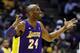Los Angeles Lakers' Kobe Bryant argues a call against the Milwaukee Bucks during the second half of an NBA basketball game, Thursday, March 28, 2013, in Milwaukee. The Bucks won 113-103.(AP Photo/Jeffrey Phelps)