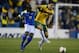 LONDON, ENGLAND - MARCH 05: Tom Rogic of Australia battles with Enner Valencia of Ecuador during the International Friendly match between Australia and Ecuador at The Den on March 5, 2014 in London, England. (Photo by Jamie McDonald/Getty Images)