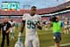 Sep 22, 2013; Miami Gardens, FL, USA; Miami Dolphins defensive end Dion Jordan (95) reacts after defeating the Atlanta Falcons at Sun Life Stadium. Mandatory Credit: Steve Mitchell-USA TODAY Sports