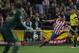 Atletico's Koke, right, takes a shot on goal during the Champions League semifinal first leg soccer match between Atletico Madrid and Chelsea at the Vicente Calderon stadium in Madrid, Spain, Tuesday, April 22, 2014. (AP Photo/Gabriel Pecot)