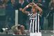 Juventus midfielder Arturo Vidal, of Chile, makes a heart-shape with his hands in celebration after scoring during an Europa League, Round of 16, soccer match between Juventus and Fiorentina, at the Juventus stadium, in Turin, Italy, Thursday, March 13, 2014. (AP Photo/ Massimo Pinca)