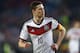 Germany's Julian Draxler watches his team mates during a friendly soccer match between Germany and Poland in Hamburg, Germany, Tuesday, May 13, 2014. (AP Photo/Matthias Schrader)
