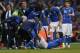 Italy's Riccardo Montolivo, lower right, is being treated after gettimg injured from a tackle during their international friendly soccer match at Craven Cottage, London, Saturday, May 31, 2014. (AP Photo/Sang Tan)