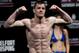 Fighter C.B. Dollaway from the US gestures as he weighs in ahead of the Ultimate Fighting Championship, UFC, in Sao Paulo, Brazil, Friday, Jan. 18, 2013. Dollaway will compete in the UFC in Sao Paulo on Jan. 19. (AP Photo/Andre Penner)