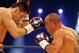 IBF Middleweight Champion Felix Sturm, left, punches his Australian challenger Sam Soliman during their IBF Middleweight title bout in Krefeld, Germany, Saturday, May 31, 2014.(AP Photo/Frank Augstein)
