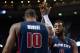 Jan 5, 2014; Auburn Hills, MI, USA; Detroit Pistons center Andre Drummond (0) high fives power forward Greg Monroe (10) during the first quarter against the Memphis Grizzlies at The Palace of Auburn Hills. Mandatory Credit: Tim Fuller-USA TODAY Sports