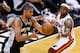 MIAMI, FL - JUNE 20: Tim Duncan #21 of the San Antonio Spurs with the ball against LeBron James #6 of the Miami Heat in the first half during Game Seven of the 2013 NBA Finals at AmericanAirlines Arena on June 20, 2013 in Miami, Florida. NOTE TO USER: User expressly acknowledges and agrees that, by downloading and or using this photograph, User is consenting to the terms and conditions of the Getty Images License Agreement. (Photo by Kevin C. Cox/Getty Images)