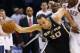 San Antonio Spurs guard Manu Ginobili (20) is fouled by Oklahoma City Thunder guard Reggie Jackson in the final minute of the second half of Game 6 of the Western Conference finals NBA basketball playoff series in Oklahoma City, Saturday, May 31, 2014. (AP Photo/Sue Ogrocki)